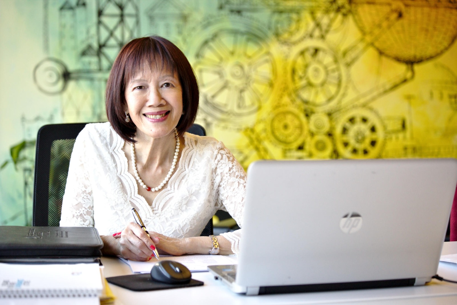 Simone at her desk — expert coach and business partner